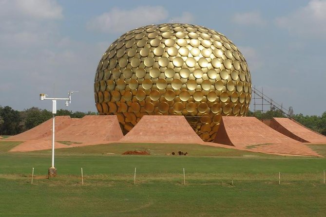 Guided City Tour in Pondicherry with complimentary refreshments - Stop 3: Matrimandir at Auroville and the entry-pass reality